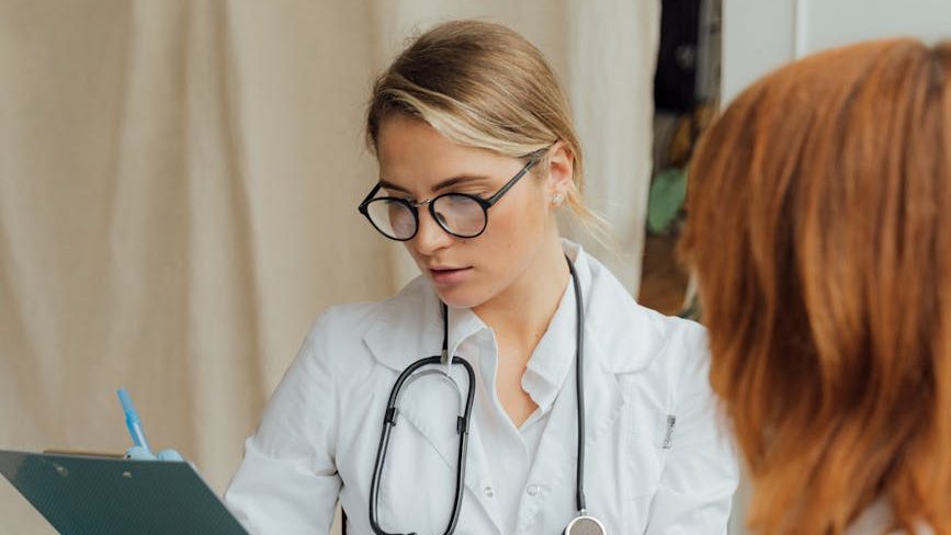 a patient having a consultation with her doctor